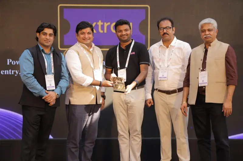 An award being presented on stage at EDEC 2026
