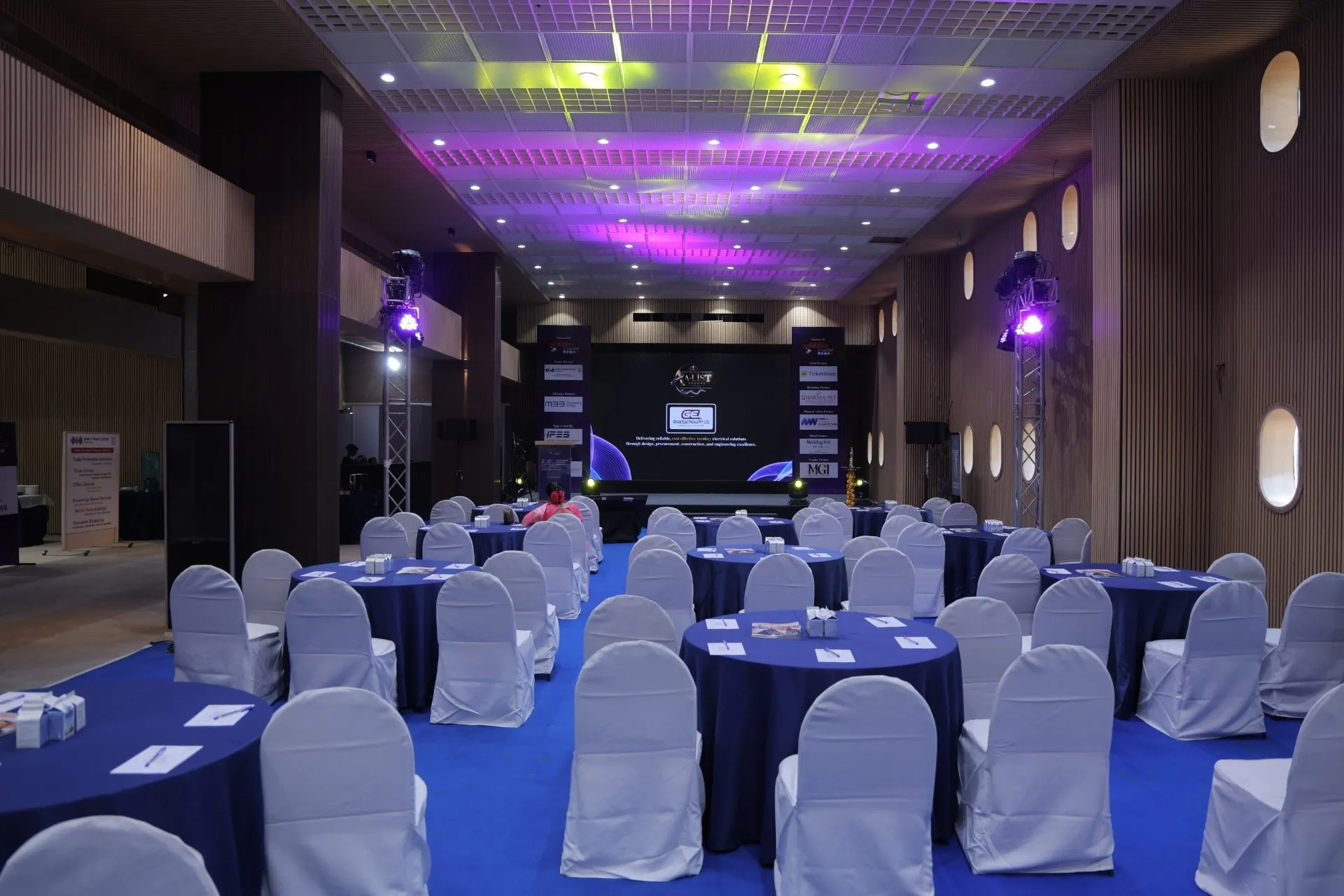 The EDEC 2026 conference hall set with round tables before the sessions
