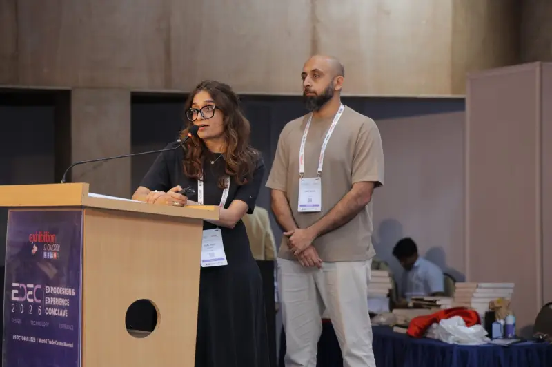 Two speakers at the podium at EDEC 2026